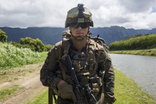 190511-M-QP663-0021 MARINE CORPS TRAINING AREA BELLOWS, HAWAII (May 11, 2019) U.S. Marine Corps Sgt. Dorian Howard, a squad leader with India Company, Battalion Landing Team 3/5, 11th Marine Expeditionary Unit (MEU), patrols during training. The Marines and Sailors of the 11th MEU are conducting routine operations as part of the Boxer Amphibious Ready Group. (U.S. Marine Corps photo by Cpl. Adam Dublinske)