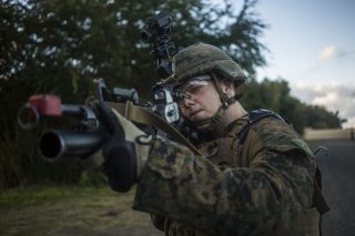 190511-M-QP663-0061 MARINE CORPS TRAINING AREA BELLOWS, HAWAII (May 11, 2019) U.S. Marine Corps Cpl. Austin Henry, a rifleman with India Company, Battalion Landing Team 3/5, 11th Marine Expeditionary Unit (MEU), watches for enemy forces during a training patrol. The Marines and Sailors of the 11th MEU are conducting routine operations as part of the Boxer Amphibious Ready Group. (U.S. Marine Corps photo by Cpl. Adam Dublinske)